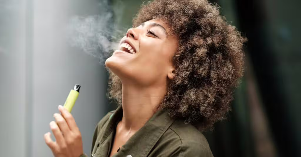 Woman Using Disposable Vape